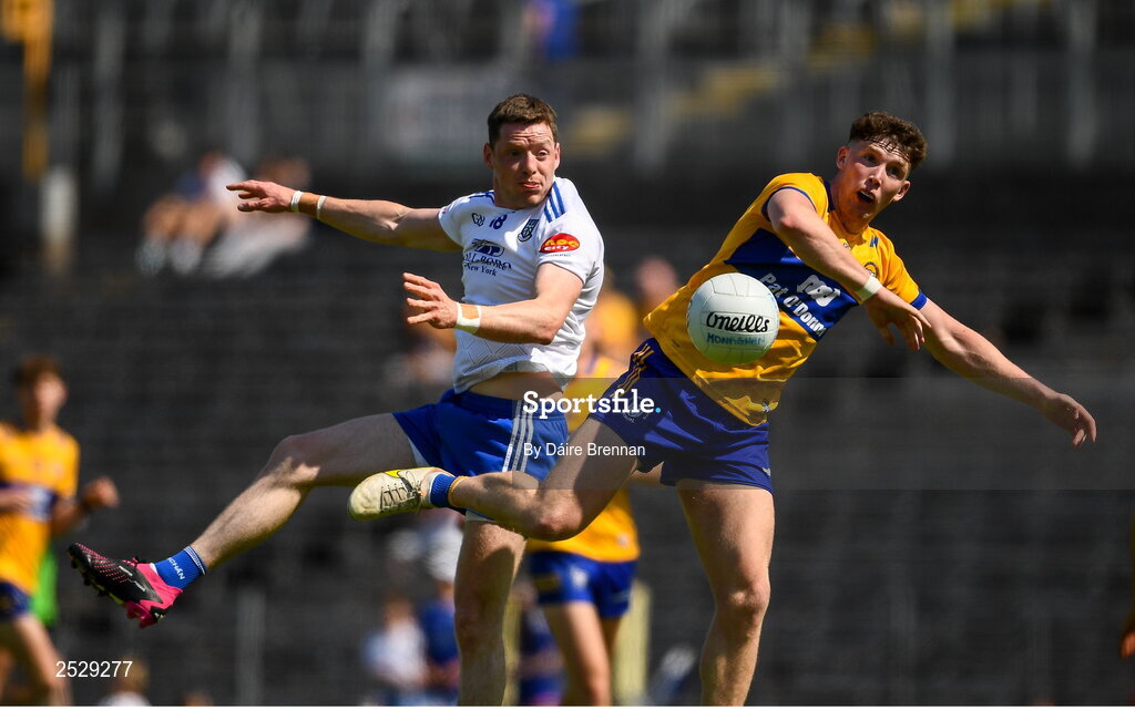 4 June 2023; Conor McManus of Monaghan in action against Cillian Rouine of Clare during the GAA Football All-Ireland Senior Championship Round 2 match between Monaghan and Clare at St Tiernach's Park in Clones, Monaghan. Photo by Daire Brennan/Sportsfile