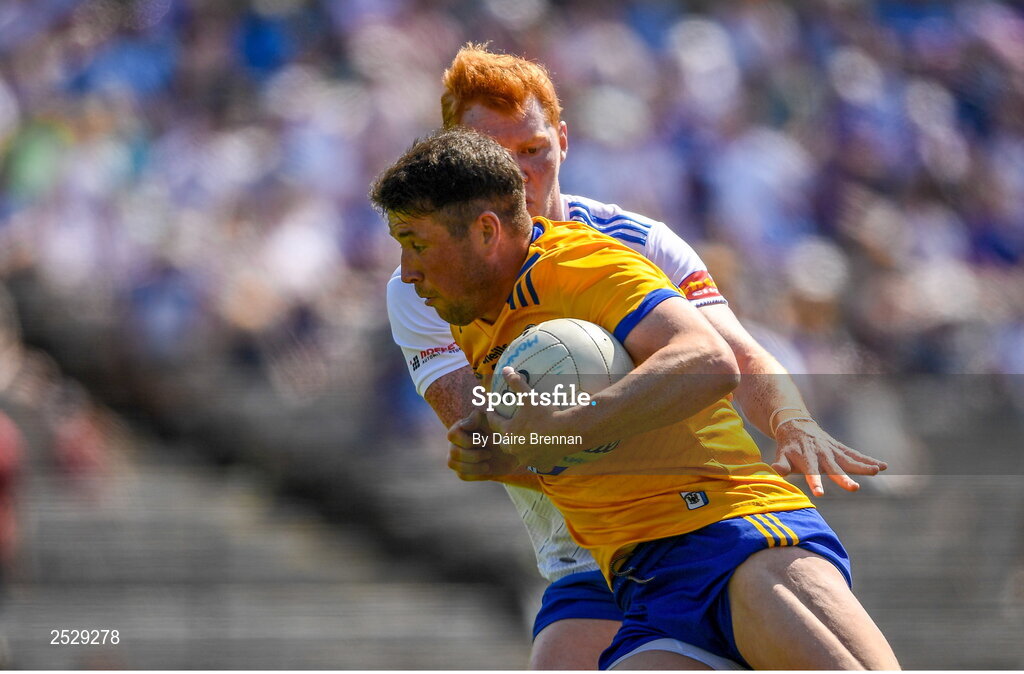 4 June 2023; Keelan Sexton of Clare in action against Ryan O'Toole of Monaghan during the GAA Football All-Ireland Senior Championship Round 2 match between Monaghan and Clare at St Tiernach's Park in Clones, Monaghan. Photo by Daire Brennan/Sportsfile