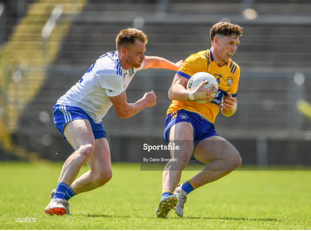 4 June 2023; Cillian Rouine of Clare in action against Ryan McAnespie of Monaghan during the GAA Football All-Ireland Senior Championship Round 2 match between Monaghan and Clare at St Tiernach's Park in Clones, Monaghan. Photo by Daire Brennan/Sportsfile