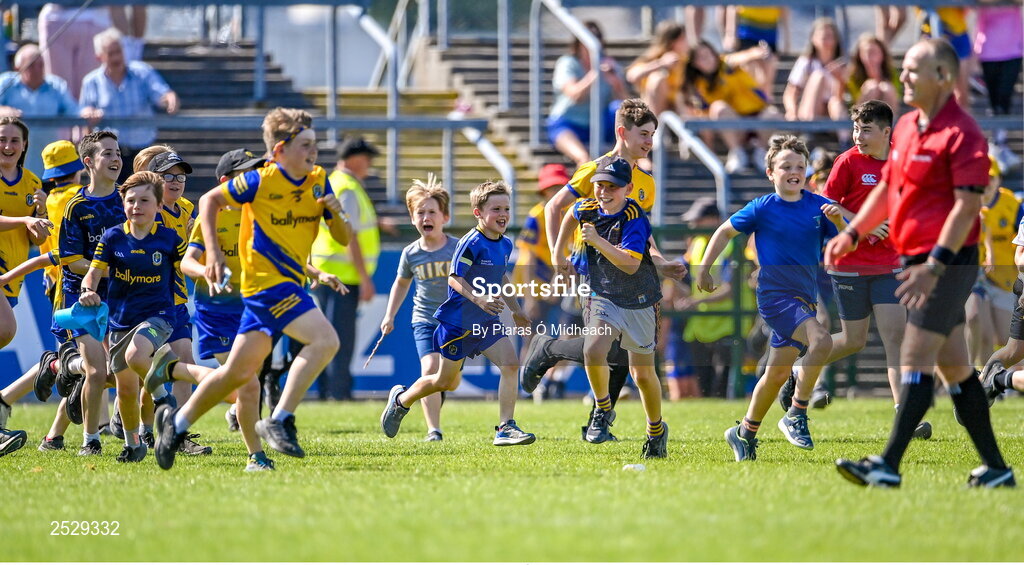 4 June 2023; Children run onto the pitch after the GAA Football All-Ireland Senior Championship Round 2 match between Roscommon and Sligo at Dr Hyde Park in Roscommon. Photo by Piaras Ó Mídheach/Sportsfile