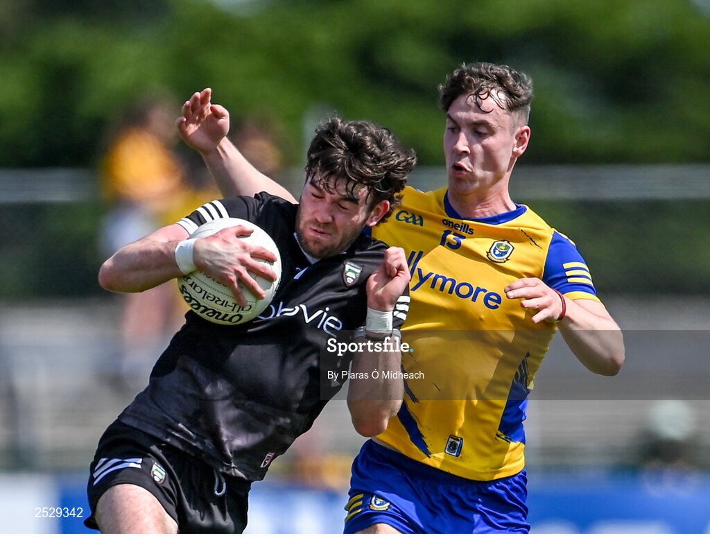 4 June 2023; Luke Towey of Sligo in action against Cian McKeon of Roscommon during the GAA Football All-Ireland Senior Championship Round 2 match between Roscommon and Sligo at Dr Hyde Park in Roscommon. Photo by Piaras Ó Mídheach/Sportsfile