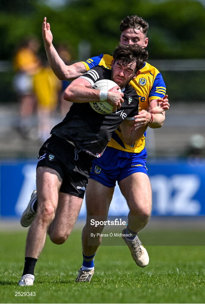 4 June 2023; Luke Towey of Sligo in action against Cian McKeon of Roscommon during the GAA Football All-Ireland Senior Championship Round 2 match between Roscommon and Sligo at Dr Hyde Park in Roscommon. Photo by Piaras Ó Mídheach/Sportsfile