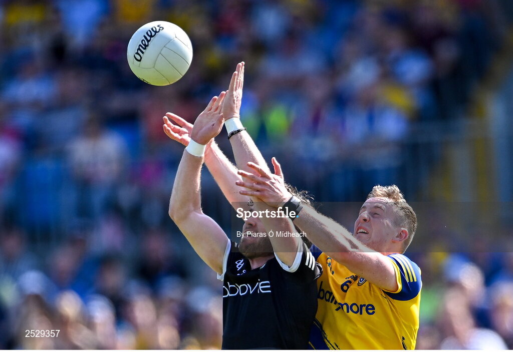 4 June 2023; Luke Towey of Sligo in action against Eoin McCormack of Roscommon during the GAA Football All-Ireland Senior Championship Round 2 match between Roscommon and Sligo at Dr Hyde Park in Roscommon. Photo by Piaras Ó Mídheach/Sportsfile