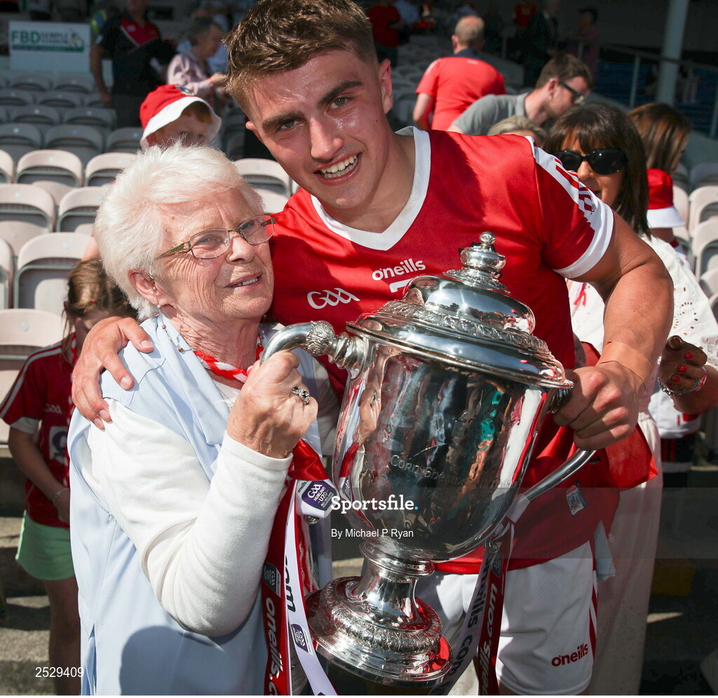 4 June 2023; Cork captain Michael Mullins is congratulated by his grandmother Esther after the O’Neills.com GAA Hurling All-Ireland U20 Championship Final match between Cork and Offaly at FBD Semple Stadium in Thurles, Tipperary. Photo by Michael P Ryan/Sportsfile