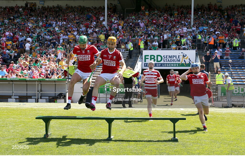 4 June 2023; Cork players including Ben Cunningham, left, and Michael Mullins make their way out for the team photograph before the O’Neills.com GAA Hurling All-Ireland U20 Championship Final match between Cork and Offaly at FBD Semple Stadium in Thurles, Tipperary. Photo by Michael P Ryan/Sportsfile