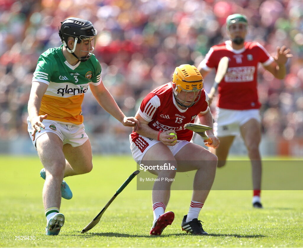 4 June 2023; Ross O'Sullivan of Cork in action against James Mahon of Offaly during the O’Neills.com GAA Hurling All-Ireland U20 Championship Final match between Cork and Offaly at FBD Semple Stadium in Thurles, Tipperary. Photo by Michael P Ryan/Sportsfile