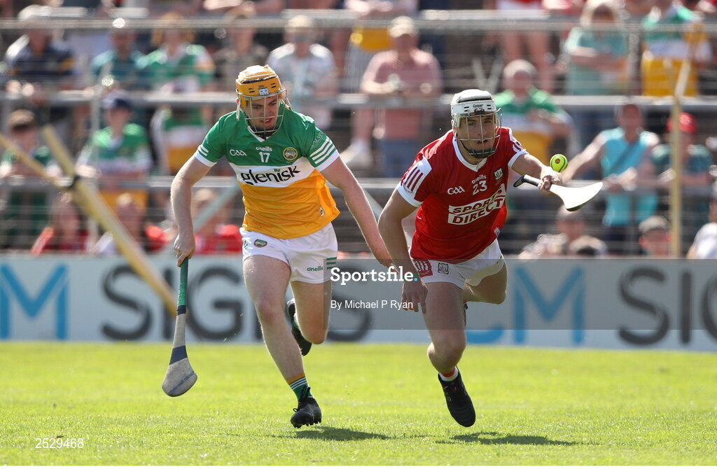 4 June 2023; Brian Keating of Cork in action against Joe Hoctor of Offaly during the O’Neills.com GAA Hurling All-Ireland U20 Championship Final match between Cork and Offaly at FBD Semple Stadium in Thurles, Tipperary. Photo by Michael P Ryan/Sportsfile