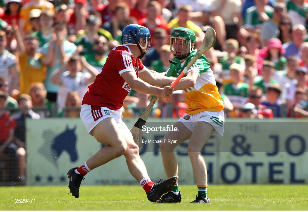 4 June 2023; Adam Screeney of Offaly in action against Darragh O'Sullivan of Cork during the O’Neills.com GAA Hurling All-Ireland U20 Championship Final match between Cork and Offaly at FBD Semple Stadium in Thurles, Tipperary. Photo by Michael P Ryan/Sportsfile