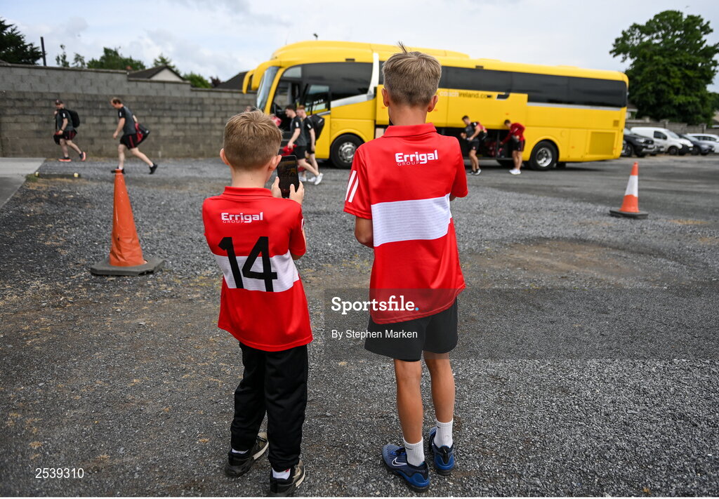 17 June 2023; Lucas Bonham, age 9, and Ollie McCann, age 11, from Limavaddy, video the arrival of the Derry team before the GAA Football All-Ireland Senior Championship Round 3 match between Derry and Clare at Glennon Brothers Pearse Park in Longford. Photo by Stephen Marken/Sportsfile