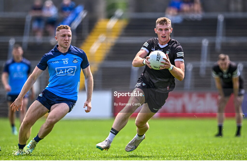 18 June 2023; Alan Reilly of Sligo in action against Paddy Small of Dublin during the GAA Football All-Ireland Senior Championship Round 3 match between Dublin and Sligo at Kingspan Breffni in Cavan. Photo by Ramsey Cardy/Sportsfile