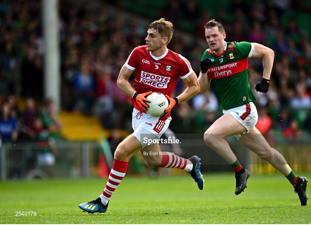 18 June 2023; Ian Maguire of Cork in action against Matthew Ruane of Mayo during the GAA Football All-Ireland Senior Championship Round 3 match between Cork and Mayo at TUS Gaelic Grounds in Limerick. Photo by Eóin Noonan/Sportsfile