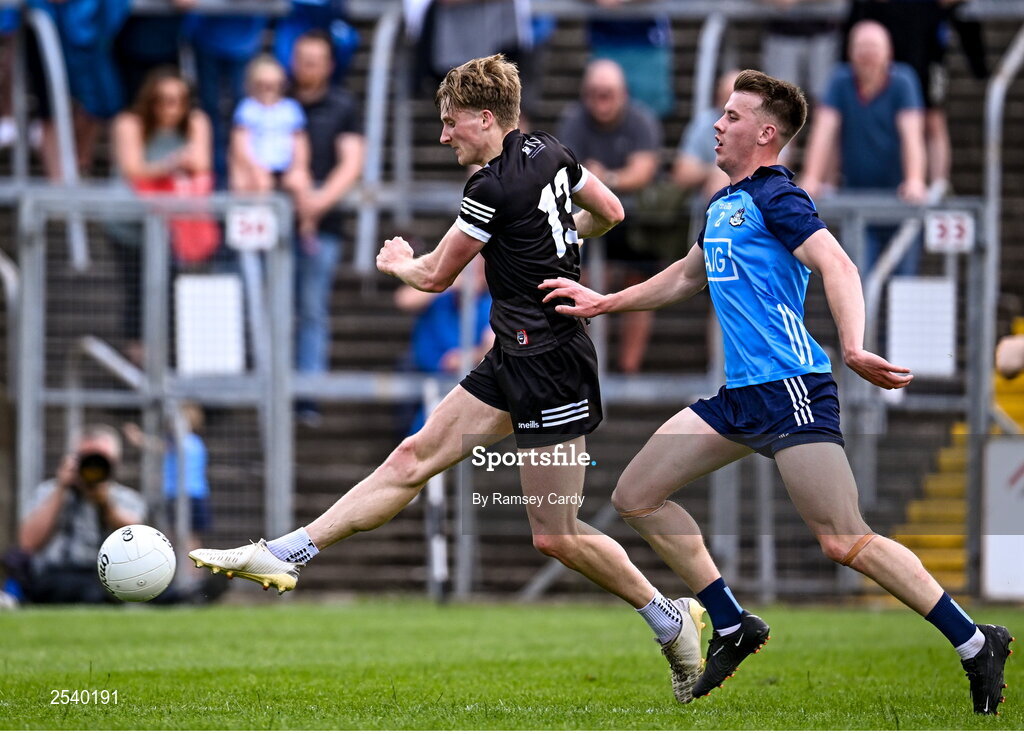 18 June 2023; Pat Spillane of Sligo shoots at goal under pressure form Daire Newcombe of Dublin during the GAA Football All-Ireland Senior Championship Round 3 match between Dublin and Sligo at Kingspan Breffni in Cavan. Photo by Ramsey Cardy/Sportsfile