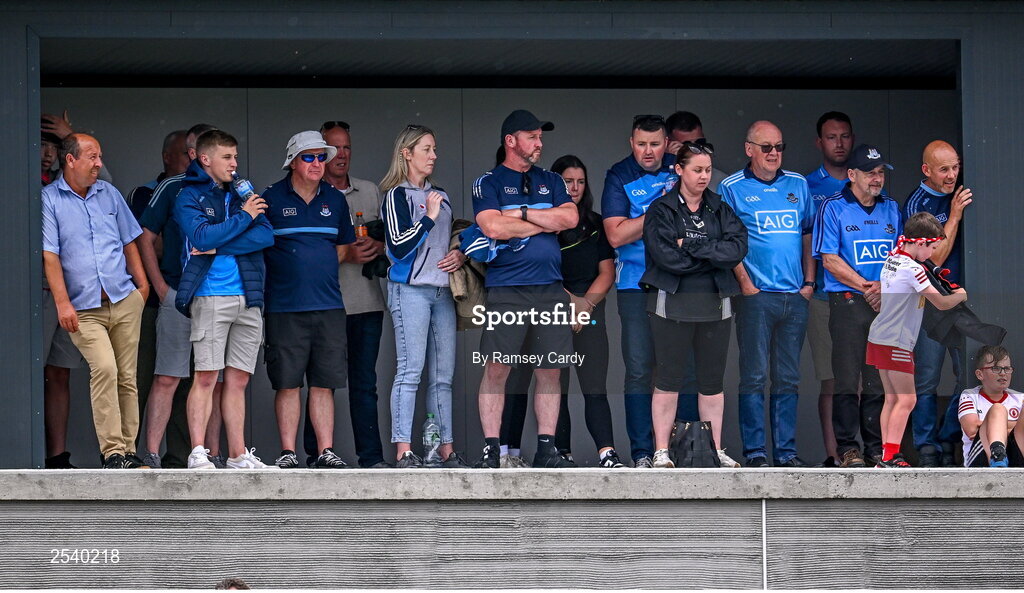 18 June 2023; Supporters shelter from the rain during the GAA Football All-Ireland Senior Championship Round 3 match between Dublin and Sligo at Kingspan Breffni in Cavan. Photo by Ramsey Cardy/Sportsfile
