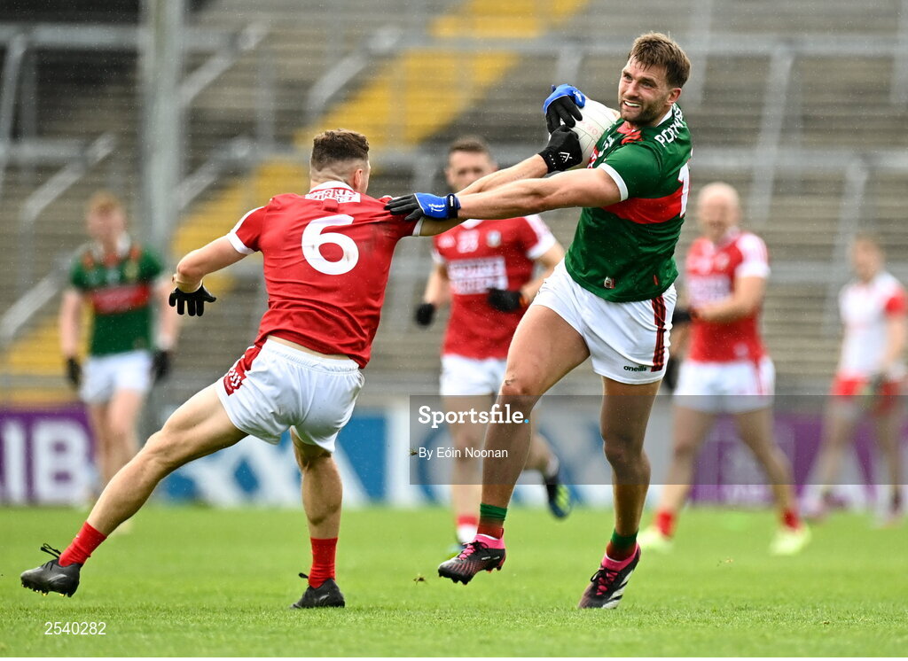 18 June 2023; Aidan O'Shea of Mayo in action against Daniel O Mahony of Cork during the GAA Football All-Ireland Senior Championship Round 3 match between Cork and Mayo at TUS Gaelic Grounds in Limerick. Photo by Eóin Noonan/Sportsfile