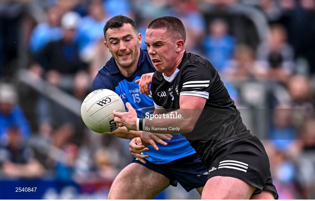 18 June 2023; Paul McNamara of Sligo in action against Colm Basquel of Dublin during the GAA Football All-Ireland Senior Championship Round 3 match between Dublin and Sligo at Kingspan Breffni in Cavan. Photo by Ramsey Cardy/Sportsfile