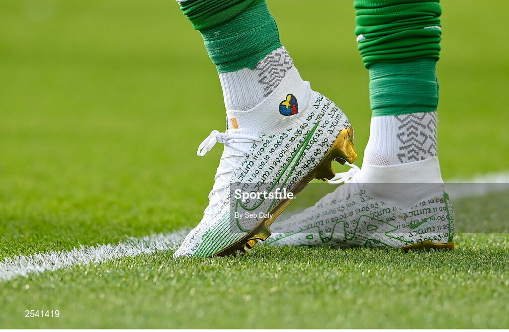 19 June 2023; A detailed view of the boots worn by Republic or Ireland captain James McClean, on the occasion of his 100th international cap before the UEFA EURO 2024 Championship qualifying group B match between Republic of Ireland and Gibraltar at the Aviva Stadium in Dublin. Photo by Seb Daly/Sportsfile