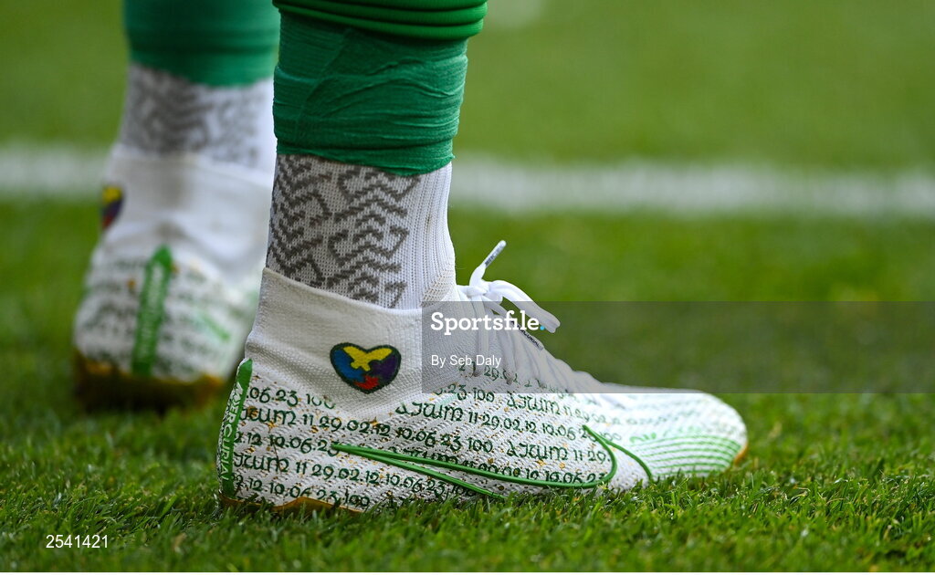 19 June 2023; A detailed view of the boots worn by Republic or Ireland captain James McClean, on the occasion of his 100th international cap before the UEFA EURO 2024 Championship qualifying group B match between Republic of Ireland and Gibraltar at the Aviva Stadium in Dublin. Photo by Seb Daly/Sportsfile