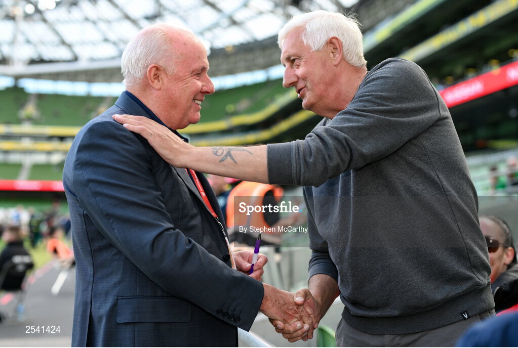 19 June 2023; Former Republic of Ireland international and RTÉ analyst Liam Brady is greeted by Jappa Murphy from Wexford Town during the UEFA EURO 2024 Championship qualifying group B match between Republic of Ireland and Gibraltar at the Aviva Stadium in Dublin. Photo by Stephen McCarthy/Sportsfile