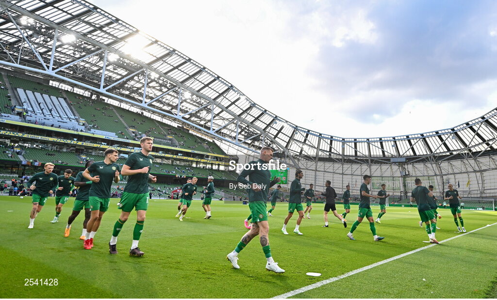 19 June 2023; James McClean of Republic of Ireland, centre, leads his side during the warm-up before the UEFA EURO 2024 Championship qualifying group B match between Republic of Ireland and Gibraltar at the Aviva Stadium in Dublin. Photo by Seb Daly/Sportsfile