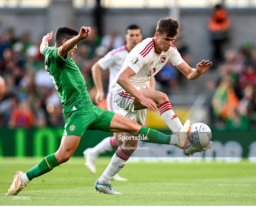 19 June 2023; Josh Cullen of Republic of Ireland in action against Niels Hartman of Gibraltar during the UEFA EURO 2024 Championship qualifying group B match between Republic of Ireland and Gibraltar at the Aviva Stadium in Dublin. Photo by Stephen Marken/Sportsfile