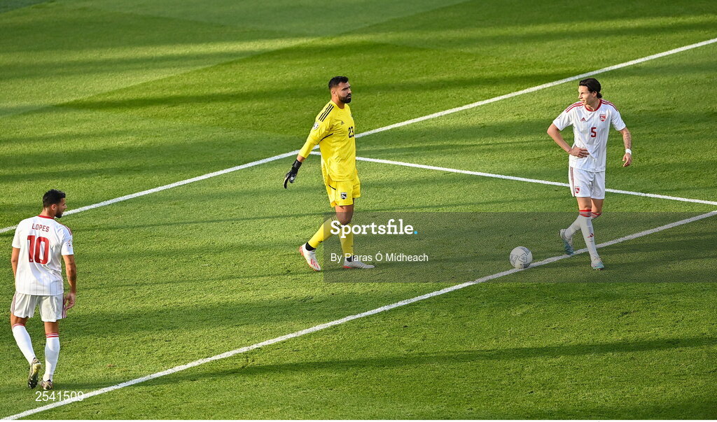 19 June 2023; Gibraltar goalkeeper Dayle Coleing with Bernardo Lopes, left, and Louie Annesley prepres to take a kick out during the UEFA EURO 2024 Championship qualifying group B match between Republic of Ireland and Gibraltar at the Aviva Stadium in Dublin. Photo by Piaras Ó Mídheach/Sportsfile
