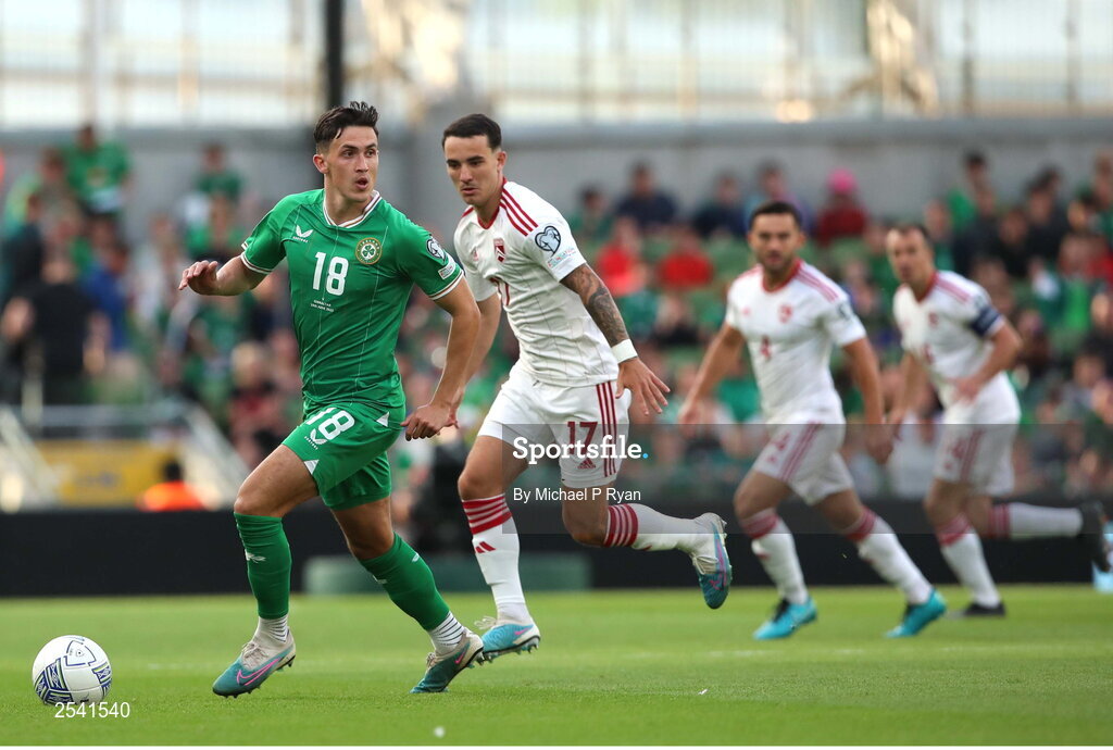 19 June 2023; Jamie McGrath of Republic of Ireland in action against Kian Ronan of Gibraltar during the UEFA EURO 2024 Championship qualifying group B match between Republic of Ireland and Gibraltar at the Aviva Stadium in Dublin. Photo by Michael P Ryan/Sportsfile