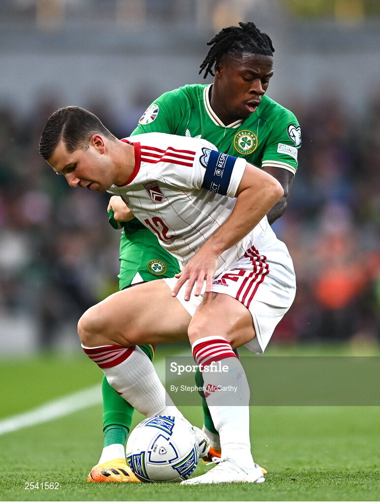 19 June 2023; Jayce Olivero of Gibraltar in action against Michael Obafemi of Republic of Ireland during the UEFA EURO 2024 Championship qualifying group B match between Republic of Ireland and Gibraltar at the Aviva Stadium in Dublin. Photo by Stephen McCarthy/Sportsfile