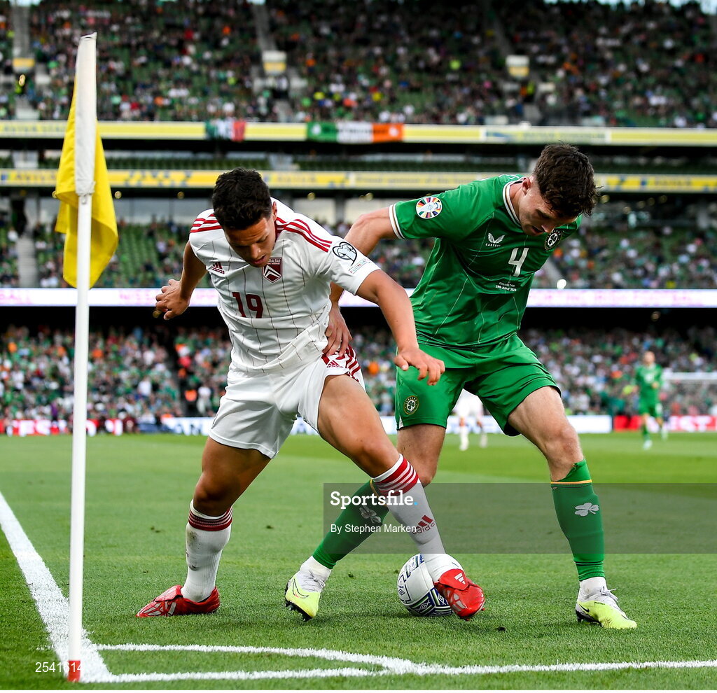 19 June 2023; Tjay De Barr of Gibraltar in action against Dara O'Shea of Republic of Ireland during the UEFA EURO 2024 Championship qualifying group B match between Republic of Ireland and Gibraltar at the Aviva Stadium in Dublin. Photo by Stephen Marken/Sportsfile