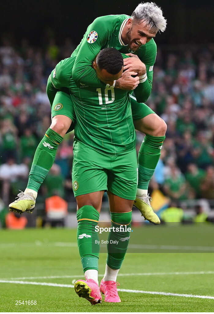19 June 2023; Adam Idah of Republic of Ireland celebrates with teammate Troy Parrott after scoring his side's third goal during the UEFA EURO 2024 Championship qualifying group B match between Republic of Ireland and Gibraltar at the Aviva Stadium in Dublin. Photo by Seb Daly/Sportsfile