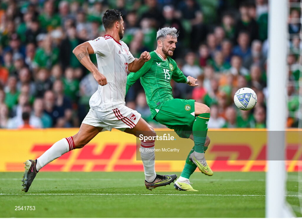19 June 2023; Troy Parrott of Republic of Ireland in action against Bernardo Lopes of Gibraltar during the UEFA EURO 2024 Championship qualifying group B match between Republic of Ireland and Gibraltar at the Aviva Stadium in Dublin. Photo by Stephen McCarthy/Sportsfile
