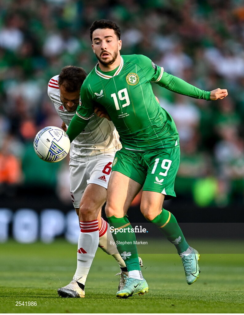 19 June 2023; Mikey Johnston of Republic of Ireland in action against Scott Wiseman of Gibraltar during the UEFA EURO 2024 Championship qualifying group B match between Republic of Ireland and Gibraltar at the Aviva Stadium in Dublin. Photo by Stephen Marken/Sportsfile