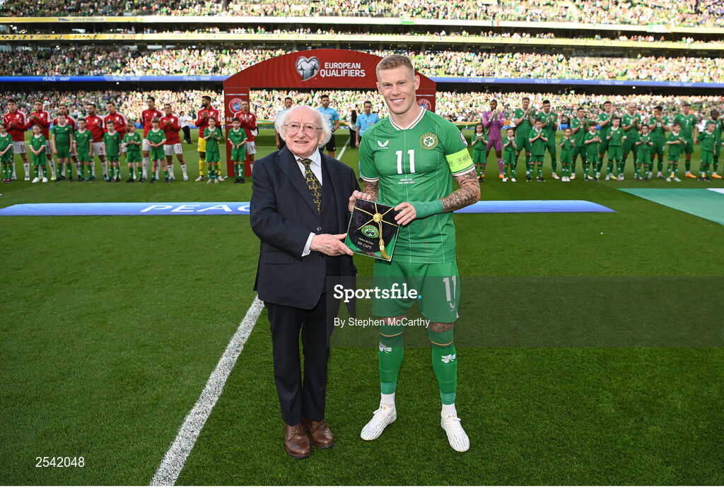 19 June 2023; President of Ireland Michael D Higgins makes a presentation to James McClean of Republic of Ireland, on the occasion of his 100th international cap, before the UEFA EURO 2024 Championship qualifying group B match between Republic of Ireland and Gibraltar at the Aviva Stadium in Dublin. Photo by Stephen McCarthy/Sportsfile