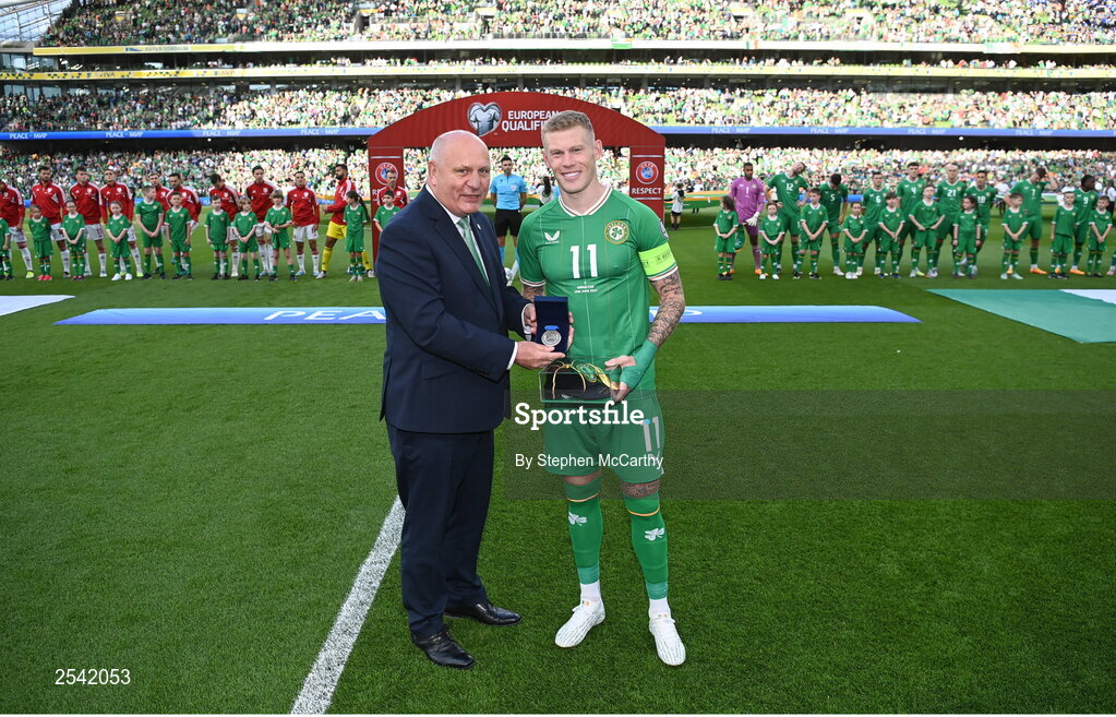 19 June 2023; FAI President Gerry McAnaney makes a presentation to James McClean of Republic of Ireland, on the occasion of his 100th international cap, before the UEFA EURO 2024 Championship qualifying group B match between Republic of Ireland and Gibraltar at the Aviva Stadium in Dublin. Photo by Stephen McCarthy/Sportsfile
