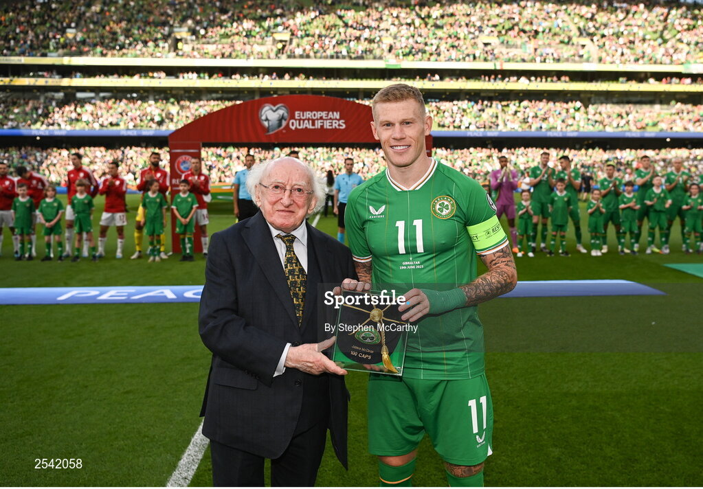 19 June 2023; President of Ireland Michael D Higgins makes a presentation to James McClean of Republic of Ireland, on the occasion of his 100th international cap, before the UEFA EURO 2024 Championship qualifying group B match between Republic of Ireland and Gibraltar at the Aviva Stadium in Dublin. Photo by Stephen McCarthy/Sportsfile