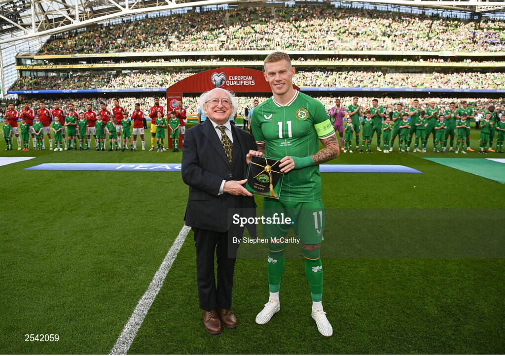 19 June 2023; President of Ireland Michael D Higgins makes a presentation to James McClean of Republic of Ireland, on the occasion of his 100th international cap, before the UEFA EURO 2024 Championship qualifying group B match between Republic of Ireland and Gibraltar at the Aviva Stadium in Dublin. Photo by Stephen McCarthy/Sportsfile