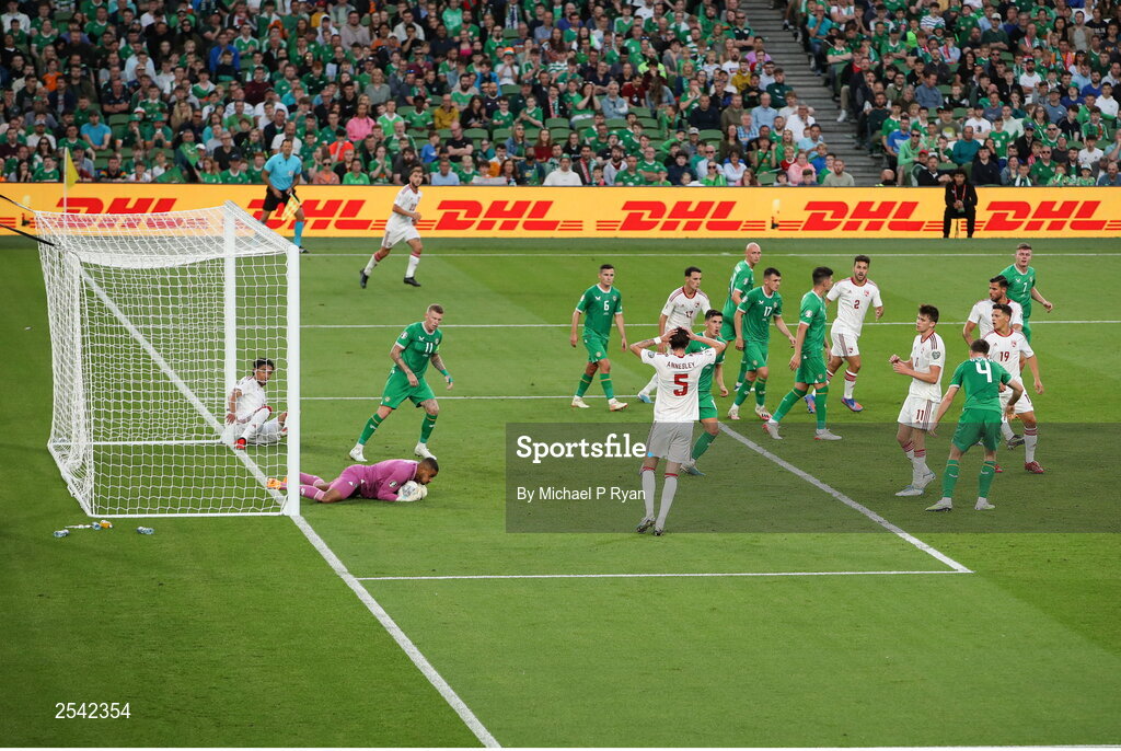 19 June 2023; Republic of Ireland goalkeeper Gavin Bazunu makes a save from Niels Hartman of Gibraltar during the UEFA EURO 2024 Championship qualifying group B match between Republic of Ireland and Gibraltar at the Aviva Stadium in Dublin. Photo by Michael P Ryan/Sportsfile