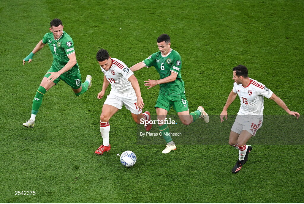 19 June 2023; Tjay De Barr of Gibraltar, supported by teammate Scott Ballantine, right, in action against Alan Browne, 8, and Josh Cullen of Republic of Ireland during the UEFA EURO 2024 Championship qualifying group B match between Republic of Ireland and Gibraltar at the Aviva Stadium in Dublin. Photo by Piaras Ó Mídheach/Sportsfile