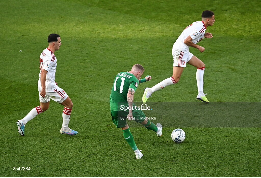 19 June 2023; James McClean of Republic of Ireland shoots under pressure from Kian Ronan, left, and Mohamed Badr of Gibraltar during the UEFA EURO 2024 Championship qualifying group B match between Republic of Ireland and Gibraltar at the Aviva Stadium in Dublin. Photo by Piaras Ó Mídheach/Sportsfile