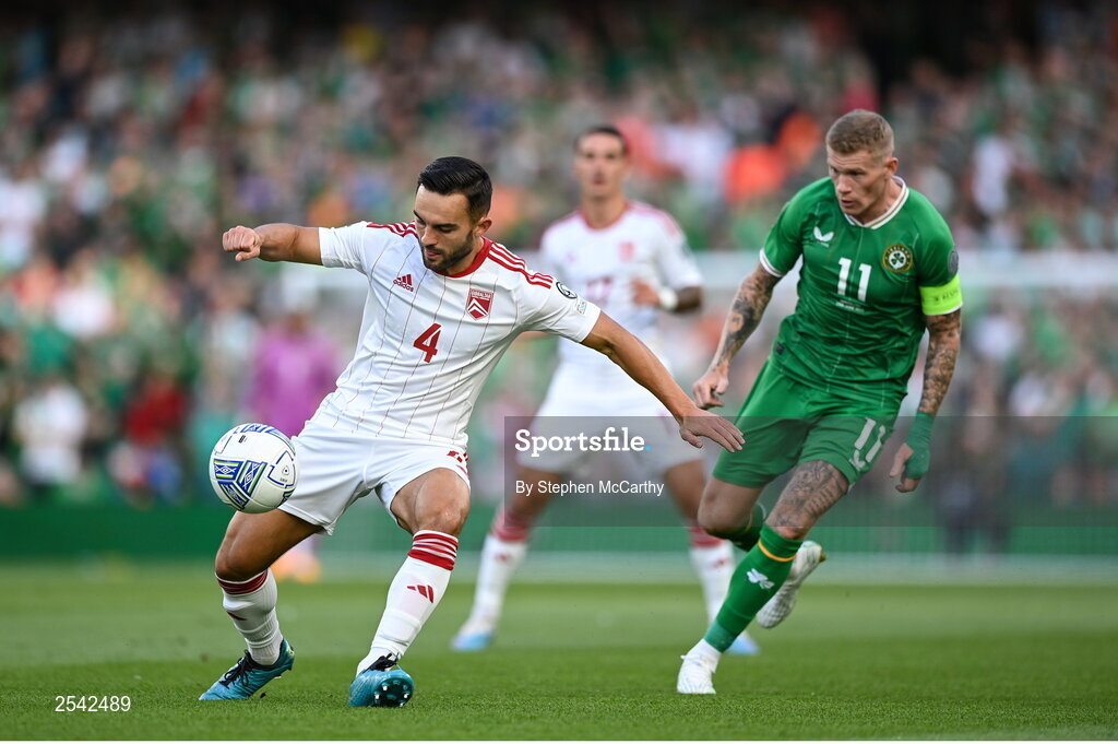 19 June 2023; John Sergeant of Gibraltar in action against James McClean of Republic of Ireland during the UEFA EURO 2024 Championship qualifying group B match between Republic of Ireland and Gibraltar at the Aviva Stadium in Dublin. Photo by Stephen McCarthy/Sportsfile