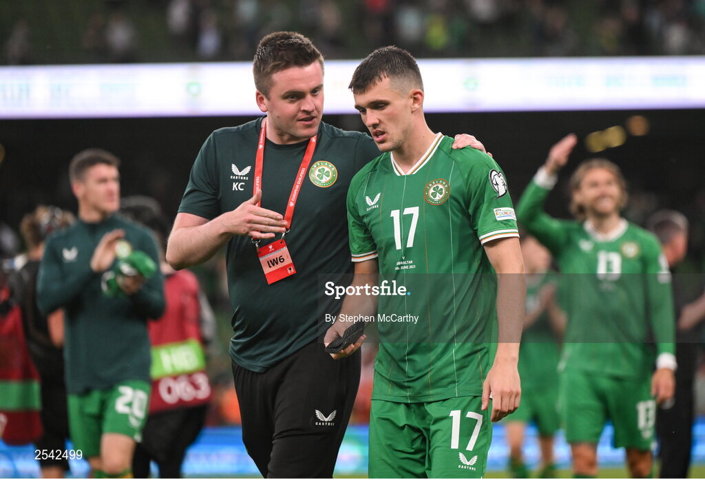 19 June 2023; Jason Knight of Republic of Ireland and Kieran Crowley, FAI communications manager, after the UEFA EURO 2024 Championship qualifying group B match between Republic of Ireland and Gibraltar at the Aviva Stadium in Dublin. Photo by Stephen McCarthy/Sportsfile