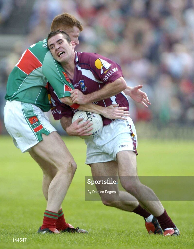27 June 2004; Damien Burke, Galway, in action against Gary Mullins, Mayo. Bank of Ireland Connacht Senior Football Championship Semi-Final, Mayo v Galway, McHale Park, Castlebar, Co. Mayo. Picture credit; Damien Eagers / SPORTSFILE