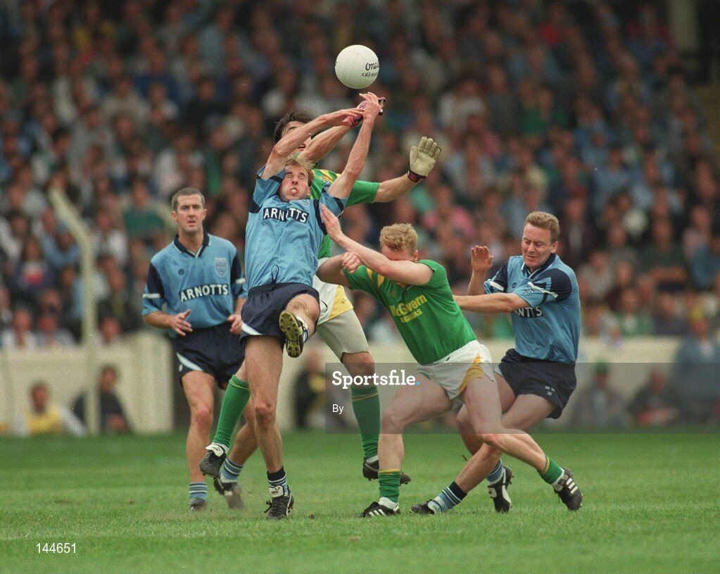 21 August 1994; Dublin's Brian Stynes contests a high ball with Leitrim's Pat Donohue as Leitrim's George Dugdale and Dublin's Keith Barr with Paul Clarke, left, await the breaking ball. Bank of Ireland Football Championship Semi Final. Dublin v Leitrim. Croke Park. Dublin. Picture credit; Ray McManus / SPORTSFILE