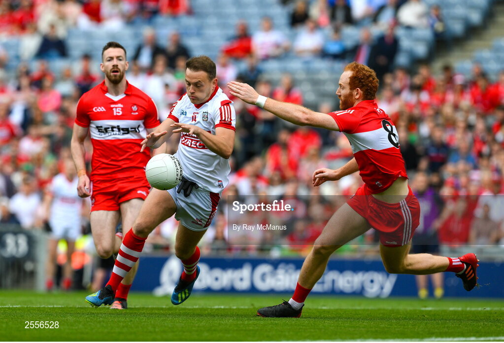 2 July 2023; Steven Sherlock of Cork in action against Conor Glass of Derry during the GAA Football All-Ireland Senior Championship quarter-final match between Derry and Cork at Croke Park in Dublin. Photo by Ray McManus/Sportsfile