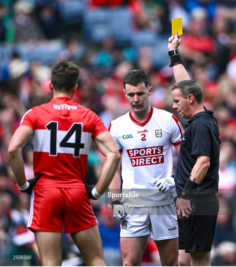 2 July 2023; Referee Joe McQuillan shows the yellow card to Maurice Shanley of Cork during the GAA Football All-Ireland Senior Championship quarter-final match between Derry and Cork at Croke Park in Dublin. Photo by Piaras Ó Mídheach/Sportsfile