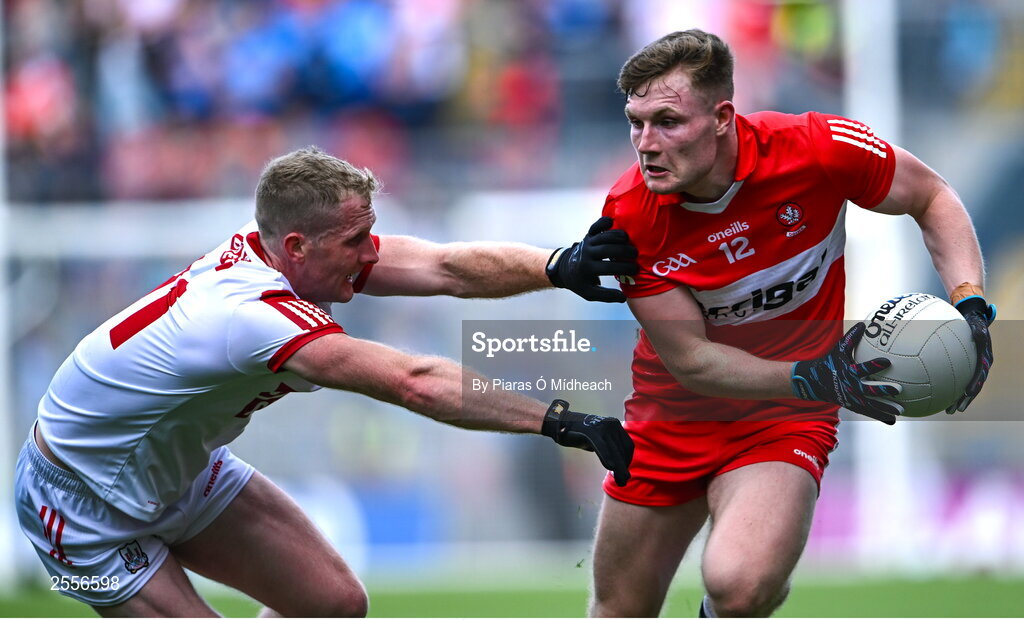 2 July 2023; Ethan Doherty of Derry in action against Ruairí Deane of Cork during the GAA Football All-Ireland Senior Championship quarter-final match between Derry and Cork at Croke Park in Dublin. Photo by Piaras Ó Mídheach/Sportsfile