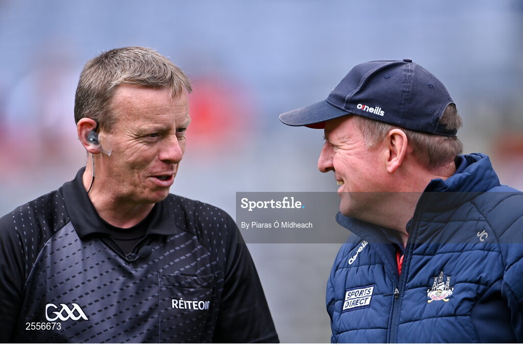 2 July 2023; Referee Joe McQuillan with Cork manager John Cleary before the GAA Football All-Ireland Senior Championship quarter-final match between Derry and Cork at Croke Park in Dublin. Photo by Piaras Ó Mídheach/Sportsfile