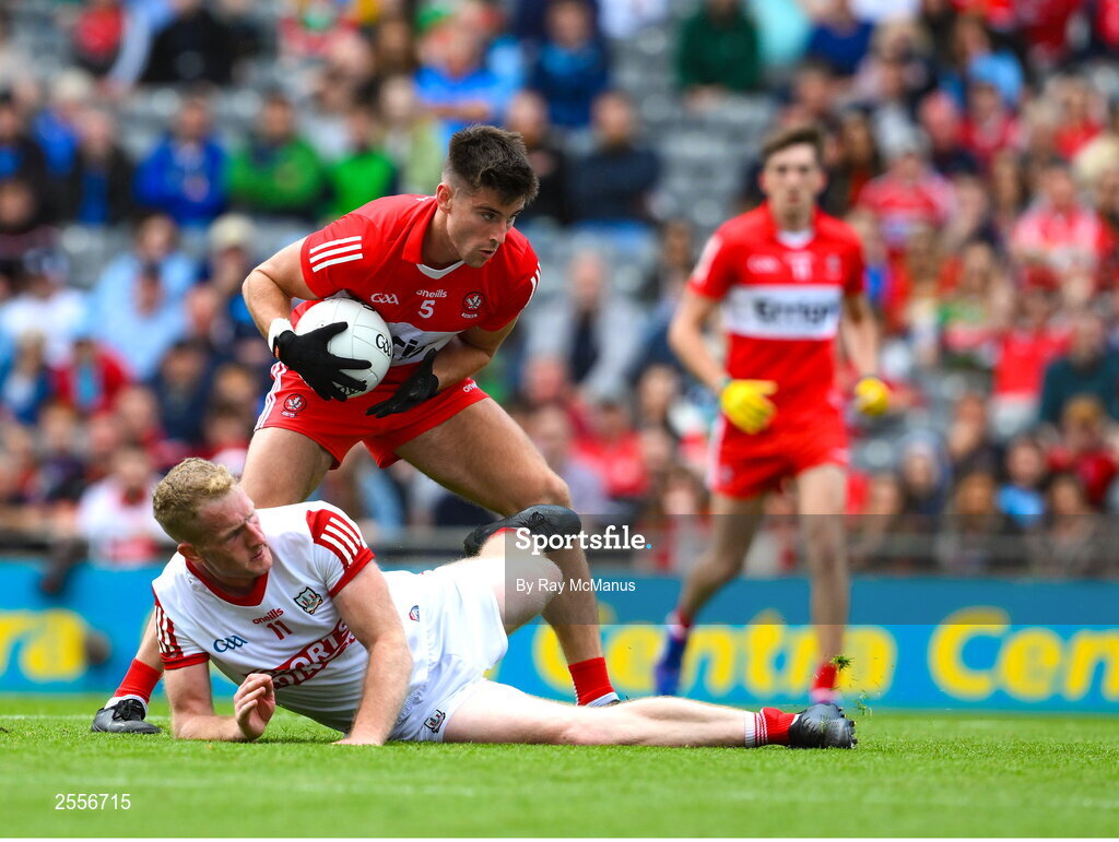 2 July 2023; Conor Doherty of Derry steps inside Ruairi Deane of Cork on his way to score a goal, in the 49th minute, during the GAA Football All-Ireland Senior Championship quarter-final match between Derry and Cork at Croke Park in Dublin. Photo by Ray McManus/Sportsfile