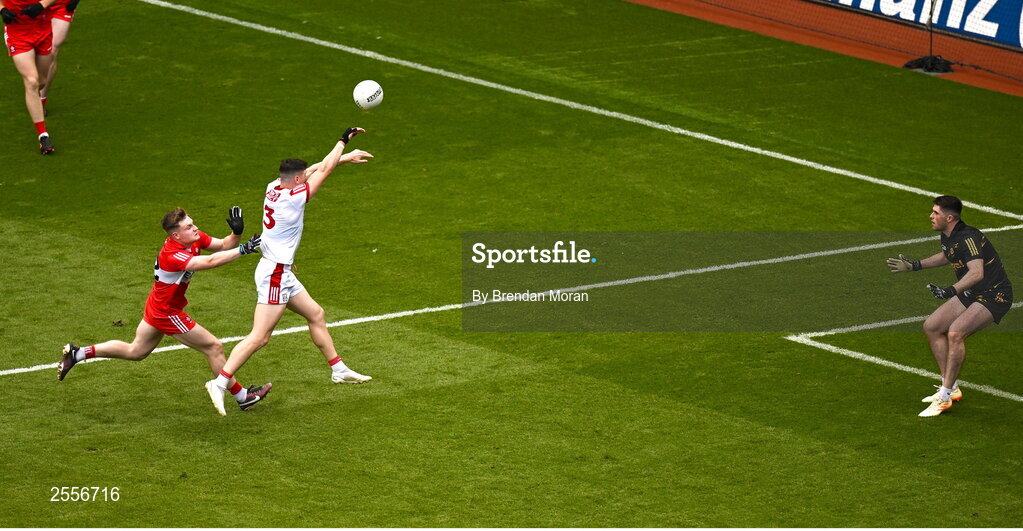 2 July 2023; Rory Maguire of Cork scores his side's first goal over the head of Derry goalkeeper Odhran Lynch during the GAA Football All-Ireland Senior Championship quarter-final match between Derry and Cork at Croke Park in Dublin. Photo by Brendan Moran/Sportsfile