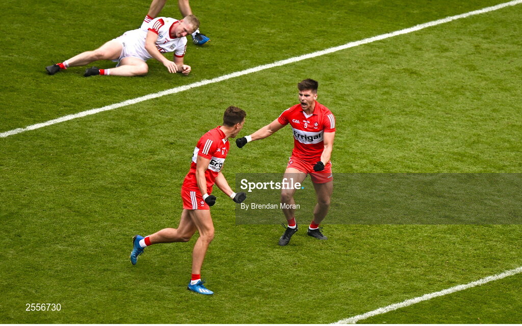 2 July 2023; Conor Doherty of Derry, right, celebrates with teammate Shane McGuigan after scoring their side's first goal during the GAA Football All-Ireland Senior Championship quarter-final match between Derry and Cork at Croke Park in Dublin. Photo by Brendan Moran/Sportsfile