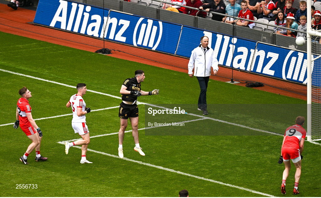 2 July 2023; Rory Maguire of Cork scores his side's first goal over the head of Derry goalkeeper Odhran Lynch during the GAA Football All-Ireland Senior Championship quarter-final match between Derry and Cork at Croke Park in Dublin. Photo by Brendan Moran/Sportsfile